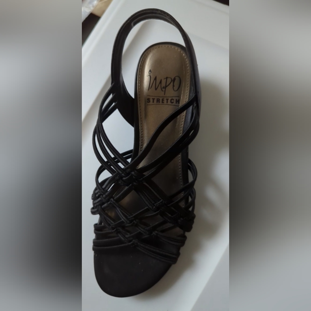 Black strappy low heel wedge sandals